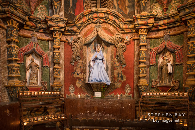 East transept of the Mission with statue of the Virgin Mary. San Xavier Del Bac, Tucson Arizona.