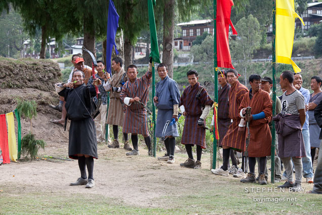 Archer shooting from one end of the range. Punakha, Bhutan.