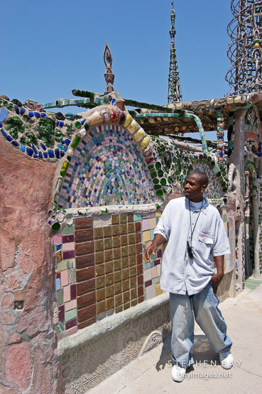 Tour guide at Watts Towers. Watts, Los Angeles, California, USA.