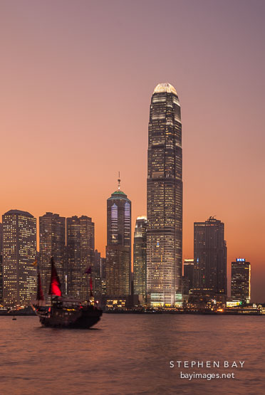 Hong Kong skyline at sunset with IFC Tower. Hong Kong, China.