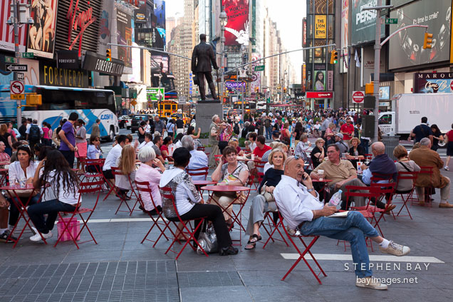 Crowd of people enjoying Times Square in New York.