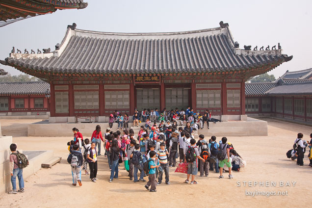 Group of school children at Gyeongbokgung Palace. Seoul, South Korea.