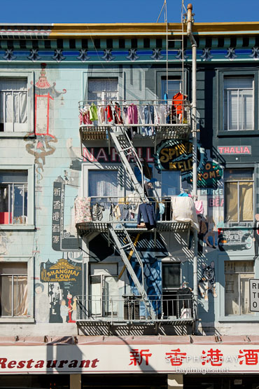 Apartment balconies and clothes. Chinatown, San Francisco, California, USA.
