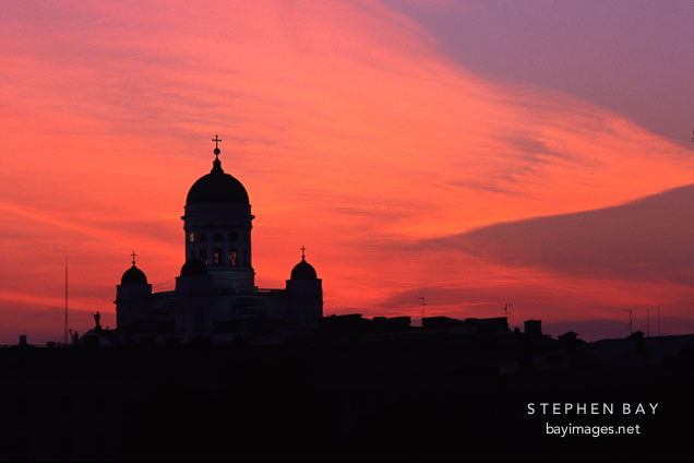 Silhouette of the Cathedral against a red sky. St. Nicholas' Church. Helsinki, Finland.