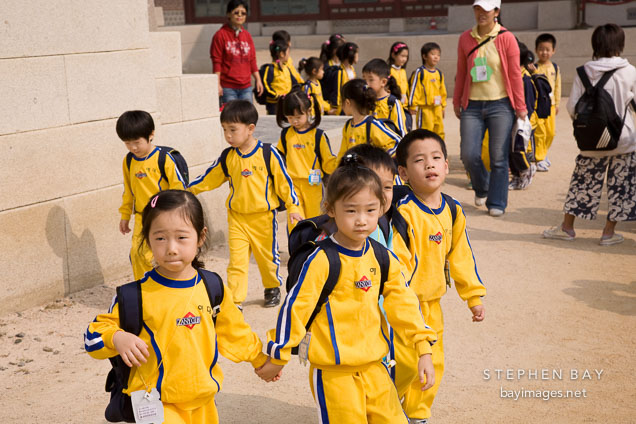 Young school children visit Gyeongbok Palace in Seoul, South Korea.