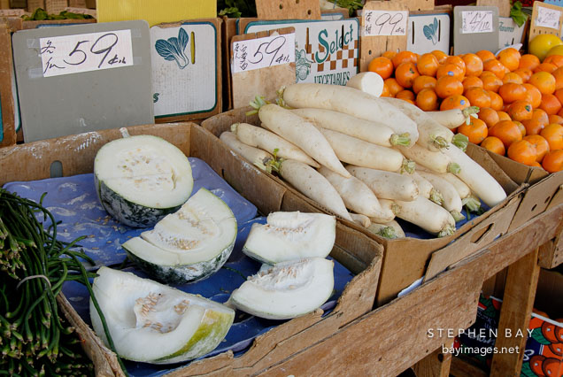Daikon radishes and other vegetables at a Chinese grocery. Chinatown, San Francisco.