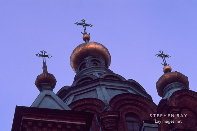 Three crosses on the top of Uspensky Cathedral. Helsinki, Finland.