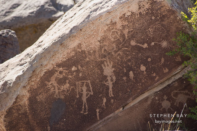 Petroglyph of human figures at Puerco Pueblo. Petrified Forest, Arizona.