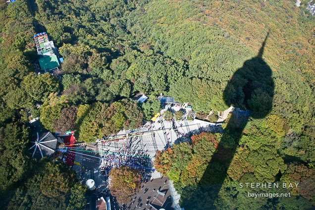 N Seoul Tower casts a shadow over Nansam Mountain in Seoul, South Korea.
