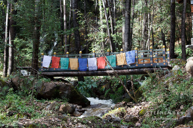 Bridge crossing a small stream. Paro valley, Bhutan.