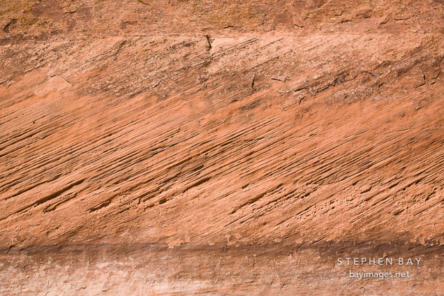 Close-up of sandstone wall with erosion from wind and water. Canyon de Chelly, Arizona.