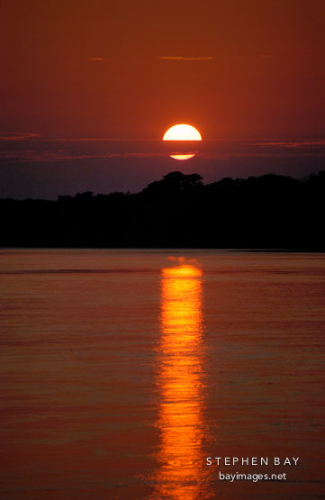 Sunrise over the Madre de Dios river. Amazon, Peru.