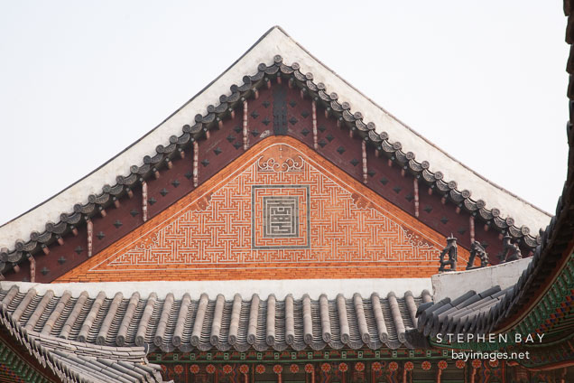 Gyeongbok Palace displays many examples of intricate Korean brick and tile work, such as seen on this palace building.