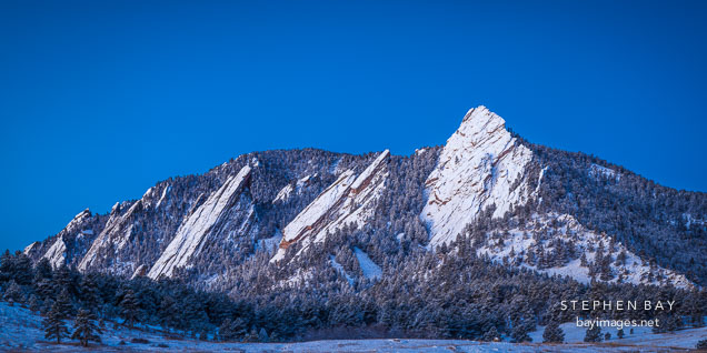 Flatirons viewed from Chautauqua meadow on a cold winter morning.