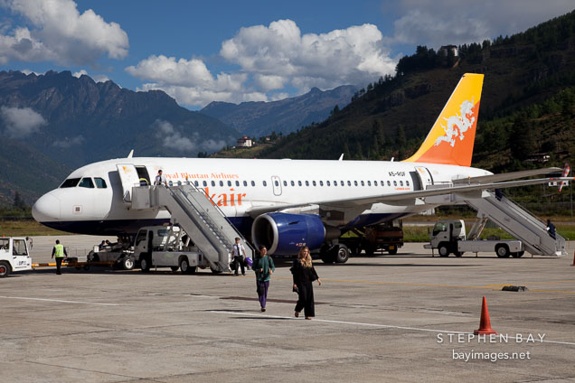Drukair plane on the runway of the Paro airport. Paro, Bhutan.
