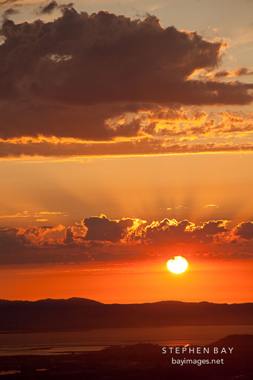 Sunset with dramatic clouds. San Francisco Bay, California.