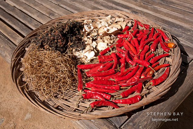 Chili peppers, mushrooms and herbs are dried in the sun at the Korean Folk Village.