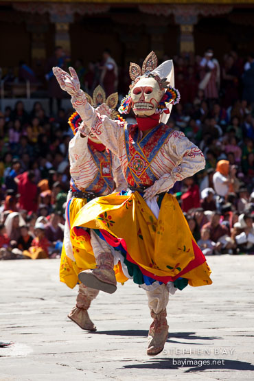 White skull mask on dancer. Thimphu tsechu, Bhutan.