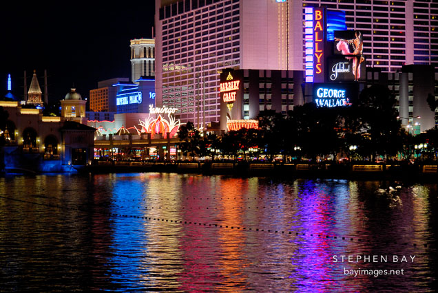 Lights from Las Vegas Boulevard reflecting onto water. Las Vegas, Nevada, USA.