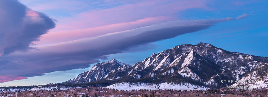 Pink skies at dawn and the Boulder Flatirons.
