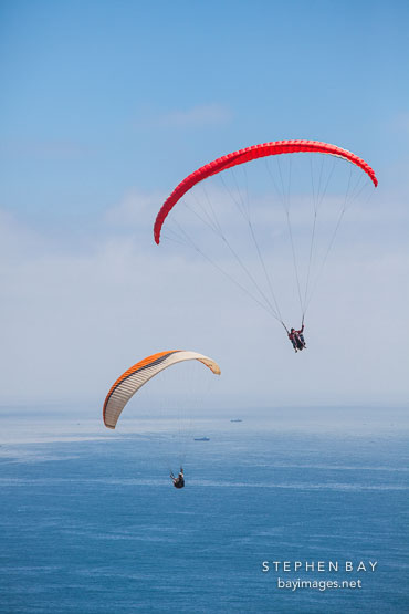 Paragliding over the ocean. La Jolla, San Diego.