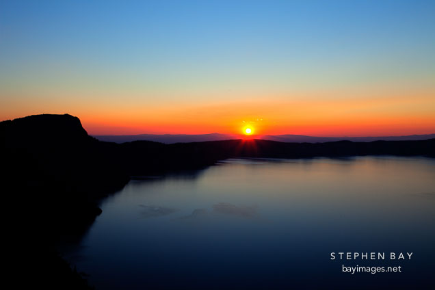 Sunrise over the caldera rim. Crater Lake, Oregon.