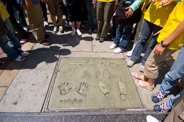 Director John Woo hand and footprints.  Grauman's Chinese Theater, Hollywood, California, USA.