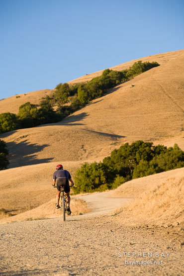 Mountain biker at Mission Peak. Fremont, California.