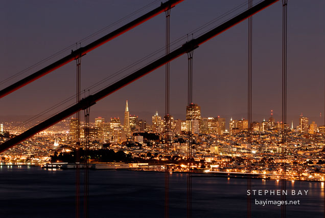 San Francisco and the cables of the Golden Gate Bridge, California, USA.