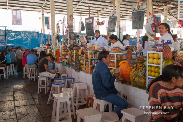 Juice bar selling drinks in the central market. Cusco, Peru.