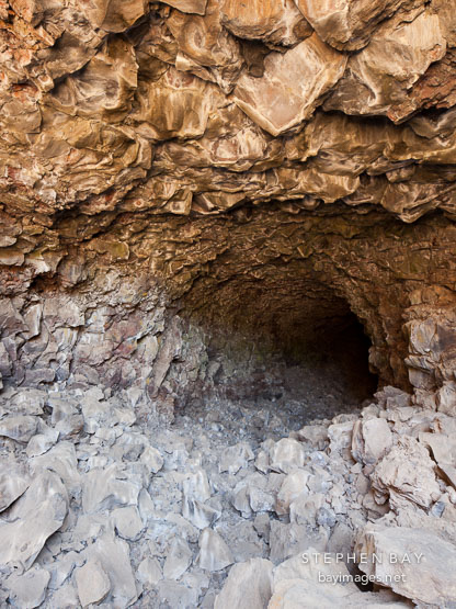 Skull Cave, a very large lava tube. Lava Beds National Monument, California.