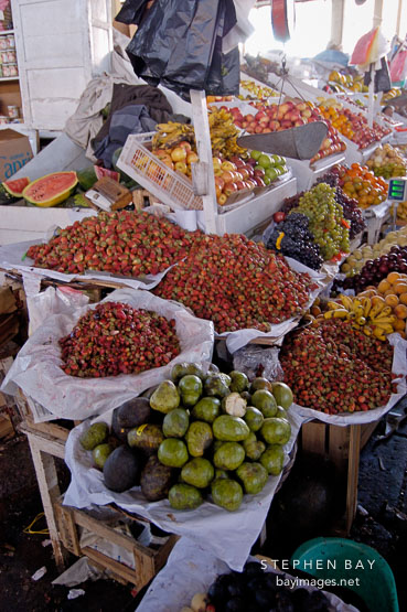 Selling produce in the central market. Cusco, Peru.