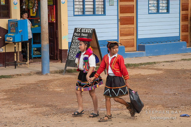Two girls practicing for the Independence Day parade. Puerto Maldonado, Peru.
