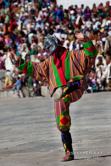 Clown entertaining the audience before the religious dances. Thimphu tsechu, Bhutan.