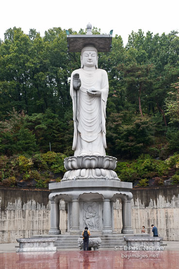 Towering statue of Buddha located at Bongeunsa Temple in Seoul.