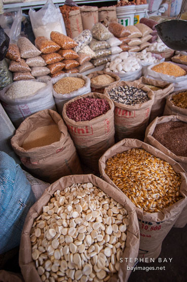 Dried beans and other produce for sale in the central market. Cusco, Peru.