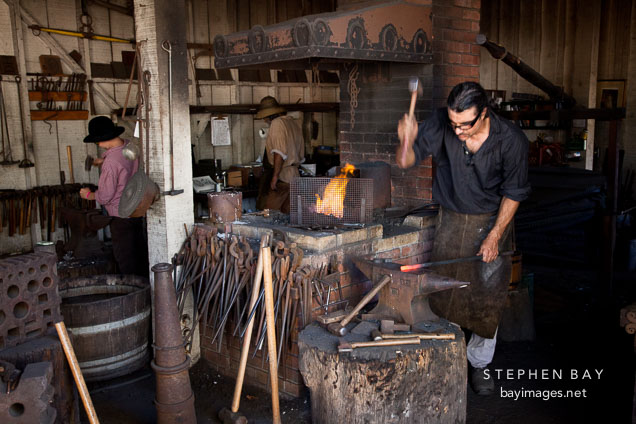 Blacksmith at work. Heritage Park, San Diego.