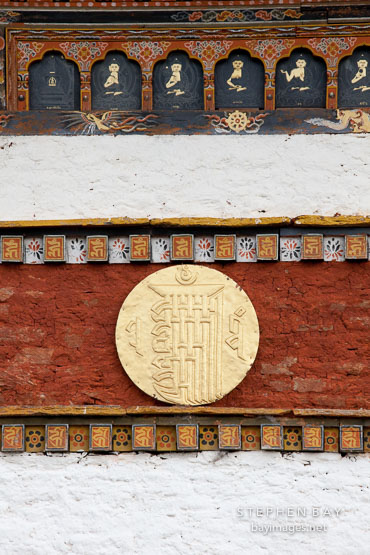Embossed gold disk on the central chorten. Druk Wangyal Chorten, Dochu La, Bhutan.