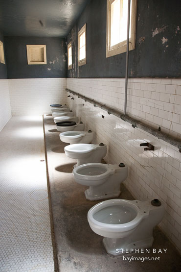 Row of toilets. Angel Island Immigration Station, California.
