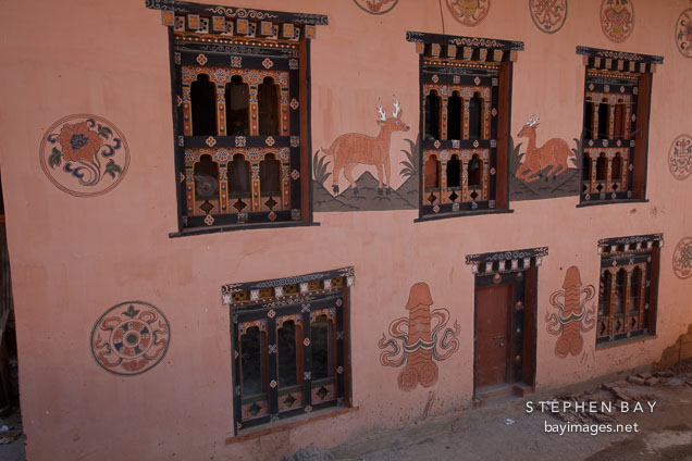 Farmhouse in Sopsokha, Bhutan decorated with paintings.