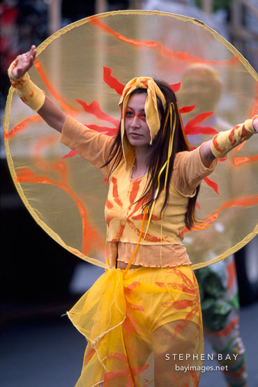 Asian woman in Carnaval's grand parade. San Francisco.