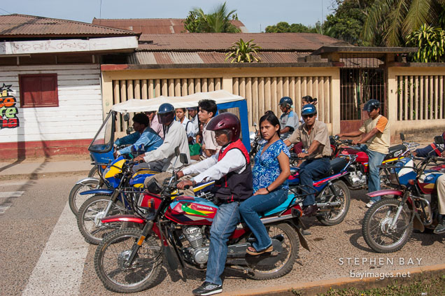 Motorcycle taxi service. Puerto Maldonado, Peru.