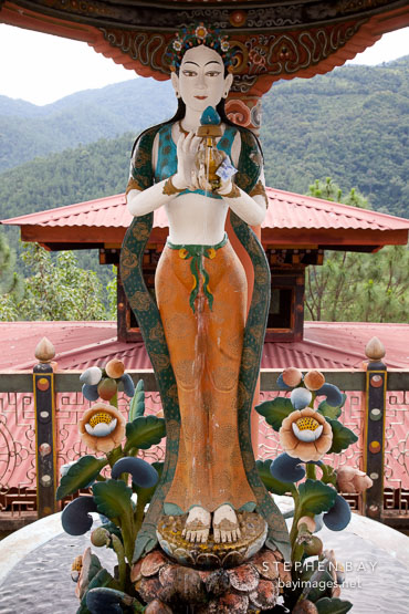 Sculpture of goddess holding a teapot at Khamsum Yuelley Namgyal Chorten. Punakha Valley, Bhutan.