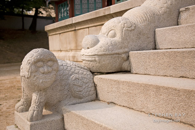 Animal figures adorn the stairs at Jibokjae.