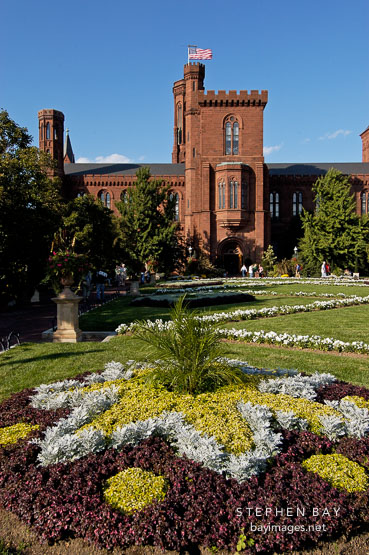 Flower bed and the Smithsonian Castle. Washington, D.C., USA