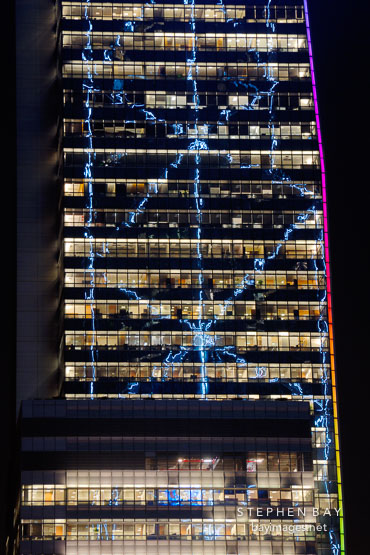 Reflection of the Bank of China Tower lights. Hong Kong, China.