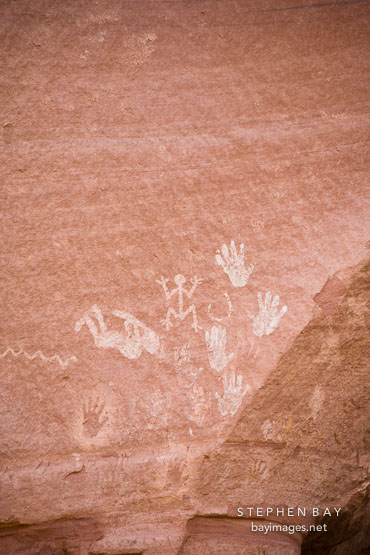 Ancient pictographs of hands and zoomorphic figures. Canyon de Chelly NM, Arizona.