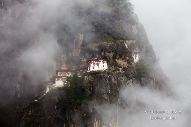 Taktshang Goemba hidden amongst the clouds. Paro Valley, Bhutan.