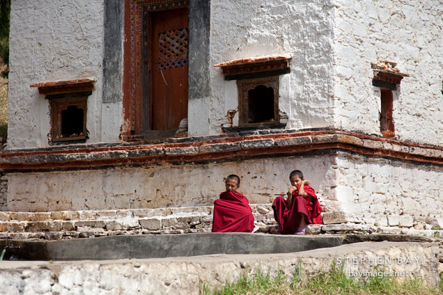 Two young buddhist monks at Wangdue Dzong. Wangdue, Bhutan.