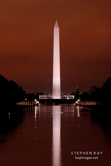Washington Monument at night with a red sky. Washington, D.C., USA.